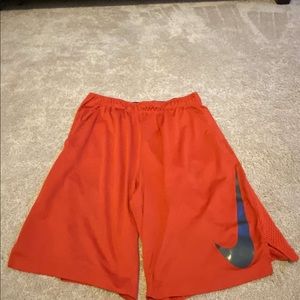 Orange Nike shorts